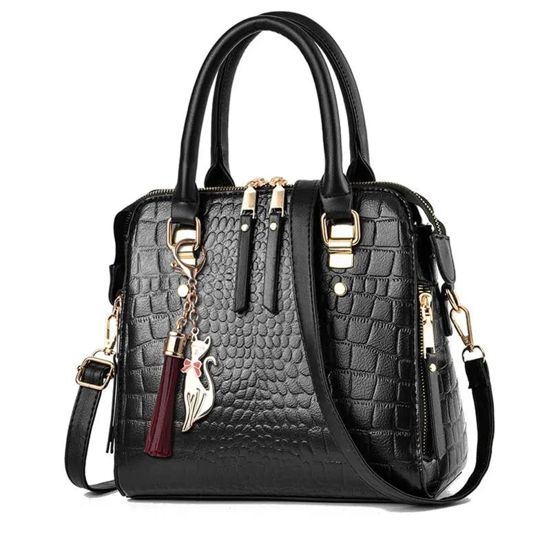 Designer tassel bag hot sale